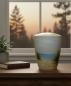 Preview: Elegant pet urn with a gentle beach motif and paw prints. A quiet, loving keepsake of the shared memories. This dignified piece is the perfect tribute – secure yours today.